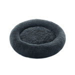 Pluizig hondenbed in de vorm van een donut