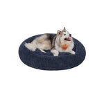 Pluizig hondenbed in de vorm van een donut