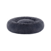 Pluizig hondenbed in de vorm van een donut