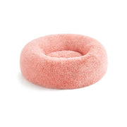 Pluizig hondenbed in de vorm van een donut