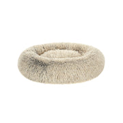 Pluizig hondenbed in de vorm van een donut