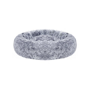 Pluizig hondenbed in de vorm van een donut