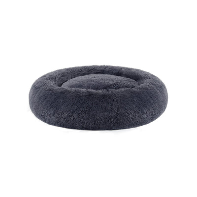 Pluizig hondenbed in de vorm van een donut